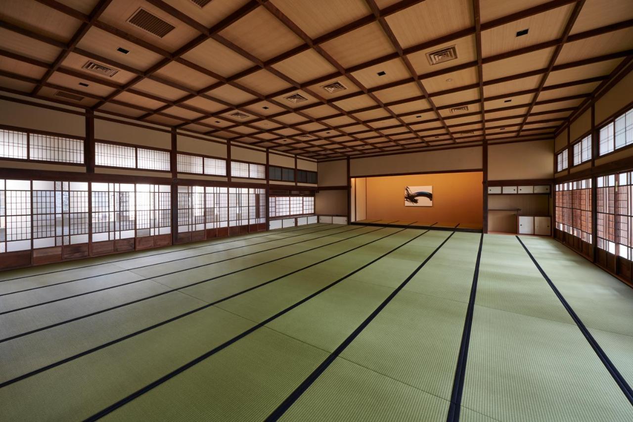 The Gate Hotel Kyoto Takasegawa By Hulic Εξωτερικό φωτογραφία A traditional Japanese room with tatami flooring